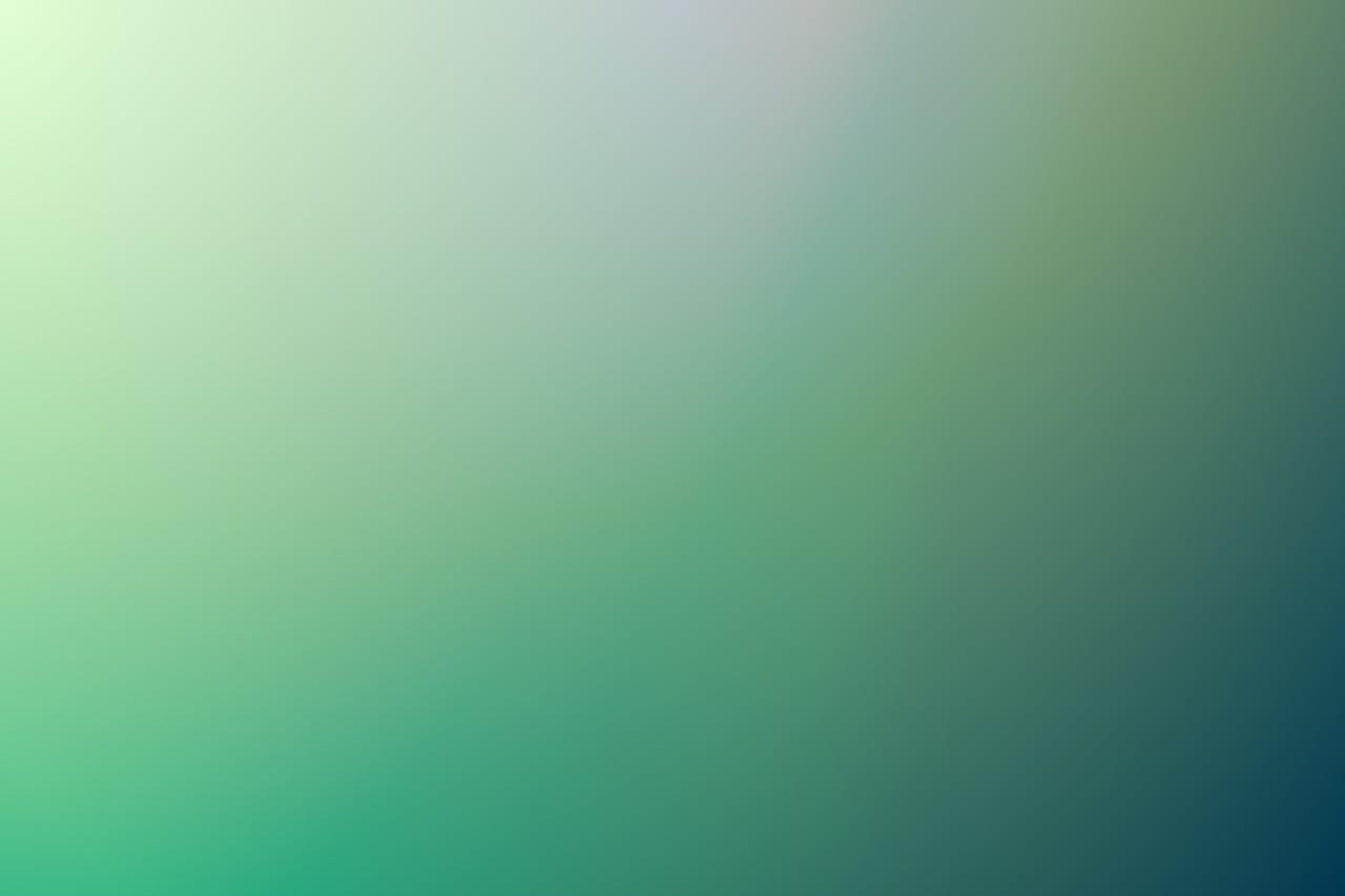 A smooth green gradient background ideal for digital design projects and wallpapers.